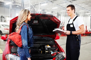 Car mechanic in uniform. Auto repair service.